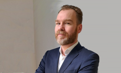 Headshot of Huw Nicholls